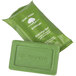 A green package of Basic Earth Botanicals massage bar soap with a green label.