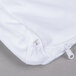 A white JT Eaton box spring cover with a zipper.