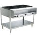 A Vollrath ServeWell electric hot food table with three black containers.