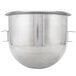 A silver stainless steel Vollrath mixing bowl with two handles.