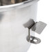 A stainless steel Vollrath mixing bowl with a metal handle.