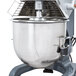 A Vollrath commercial stand mixer with a stainless steel bowl.