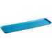 A blue rectangular Cambro market tray with a rounded edge.