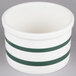 A white bowl with green stripes and a handle.
