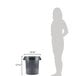 A woman standing next to a grey Continental Huskee trash can.