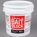 A white JT Eaton pail with red text filled with apple flavored bait blocks.