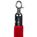 A red Aarco stanchion rope with chrome metal ends.