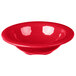 A red bowl with a white rim.