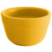 A yellow Tuxton China bouillon bowl.