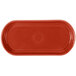 A red rectangular Fiesta bread tray with a circle in the middle.