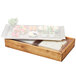 A Cal-Mil Madera wood tray with sushi and cheese in a wooden box with a cold pack.