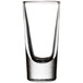 A close-up of a clear Libbey Tequila Shooter glass.