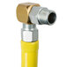 A yellow T&S Safe-T-Link Gas Hose with a silver swivel fitting.