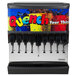 A Servend countertop beverage dispenser with ice and a colorful label.