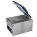 A stainless steel Hamilton Beach PrimaVac 305 chamber vacuum sealer with a lid open.