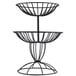 An American Metalcraft wrought-iron two-tier basket stand holding two black wire baskets.