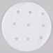 A white round paper disc with perforations.