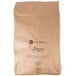 A brown bag of King Arthur Flour Hi-Gluten Flour with black text on it.