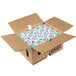 A white cardboard box filled with blue and white Hood sour cream portion cups.
