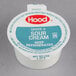 A white Hood sour cream portion container with a blue and white label.