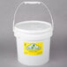 A white bucket with a yellow lid and label.