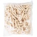 A bag of Tyson Red Label Fully Cooked Grilled Chicken Breast Strips on a white background.