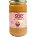 A jar of Kime's No Sugar Added Applesauce on a table.