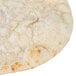 A close up of a round white pita bread.