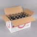 A white box with a brown lid containing 6 Boylan Bottling Co. Diet Black Cherry Soda 4-packs.