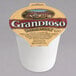 A white Grandioso garlic sauce dipping cup with a label.