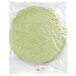 A green Mission spinach herb tortilla wrapped in plastic.