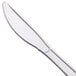 A close-up of a WNA Comet Reflections stainless steel look plastic knife with a white handle.