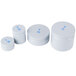 Three white plastic containers with blue writing on the front.