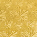 A close up of a gold square cake drum with a leaf pattern on the surface.