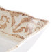 A white melamine tray with a brown design.