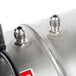 A close up of a stainless steel tank with two pipes on a McCann's Big Mac Fastflow Carbonator.