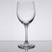 A clear Libbey Bristol Valley wine glass on a reflective surface.