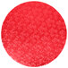 A red round Enjay cake board with a pattern on it.