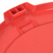 A red plastic lid for a Continental Huskee round trash can.