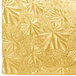 A gold patterned surface with swirls.
