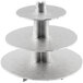 An Enjay silver disposable cupcake stand with three tiers on a table in a bakery display.