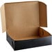 A black Enjay half sheet cake box with a brown lid.