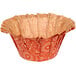 A white background with a red paper Enjay cupcake liner with a pattern.