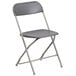 A Flash Furniture grey plastic folding chair with a metal frame.
