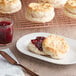 A plate of Pillsbury Southern Style biscuits with jam on the side.