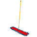 A red and blue Lavex microfiber mop with a red handle.