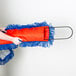 A person holding a blue and orange Lavex microfiber dust mop with a long handle.