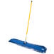 A Lavex blue microfiber mop with a yellow handle.