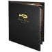 A black Menu Solutions Chadwick Collection leather-like menu cover with gold text on a table in a seafood restaurant.