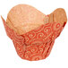 A red paper Enjay baking cup with a mariposa print.
